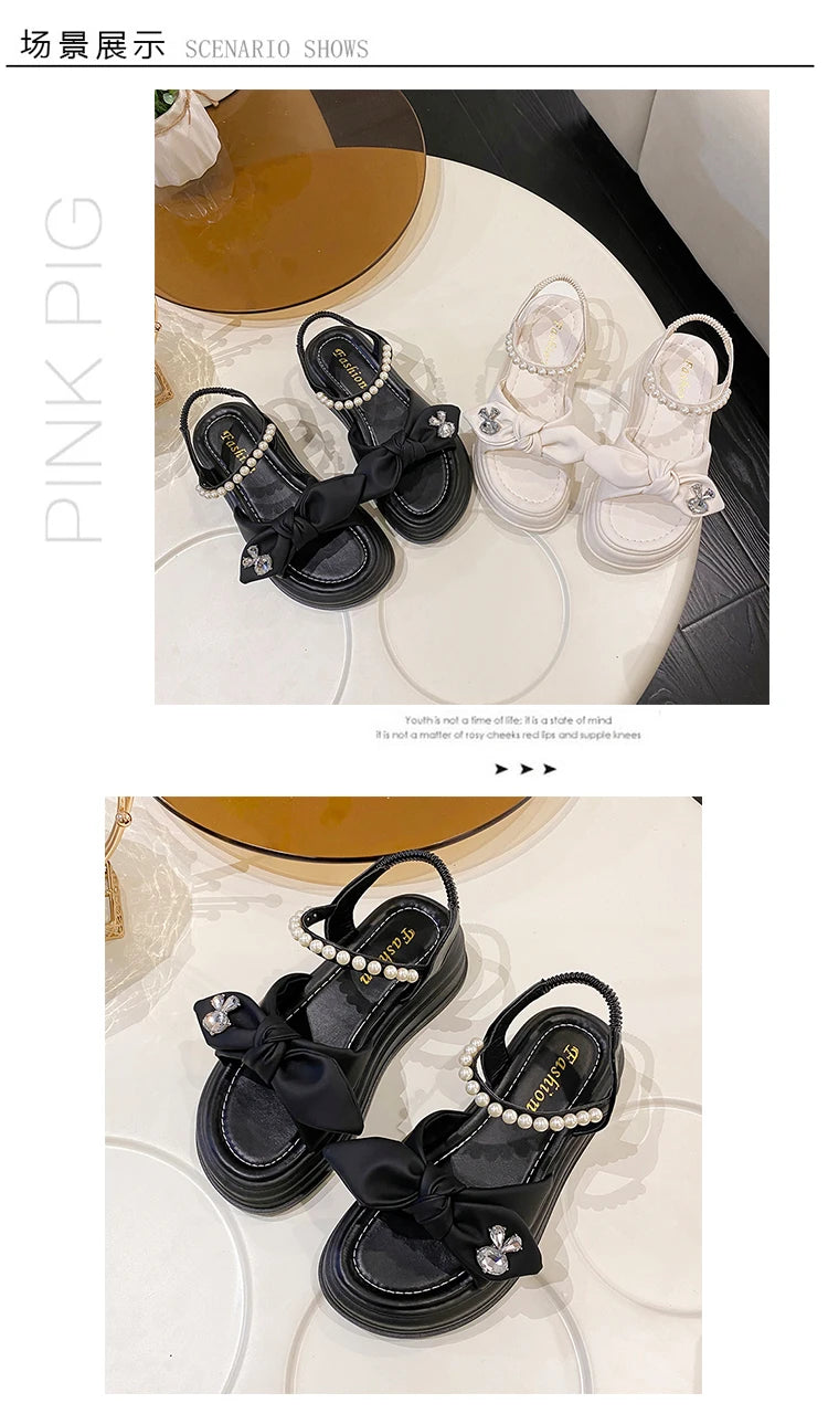 Hot selling sandals for women in summer 2024, new thick soled fairy style pearl beach shoes, soft soled fashion Roman shoes